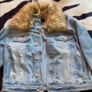 Jean jacket with rips